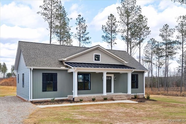 view of front of property with a front lawn and a porch