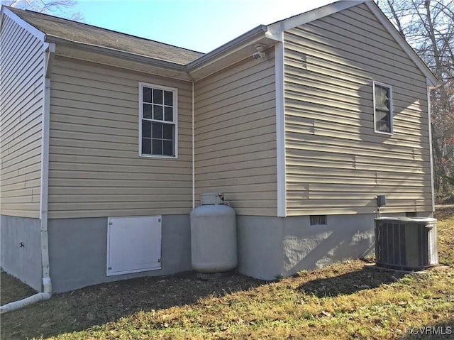 view of property exterior with cooling unit