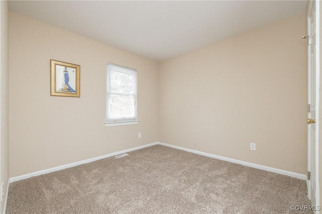 view of carpeted spare room