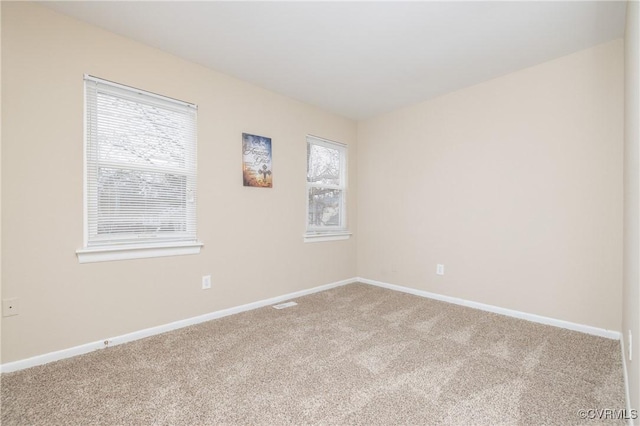 view of carpeted spare room