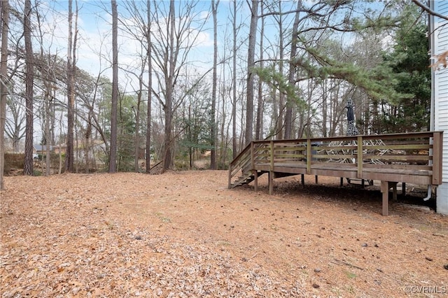 view of yard with a deck