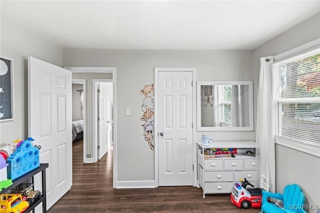 playroom featuring dark hardwood / wood-style flooring