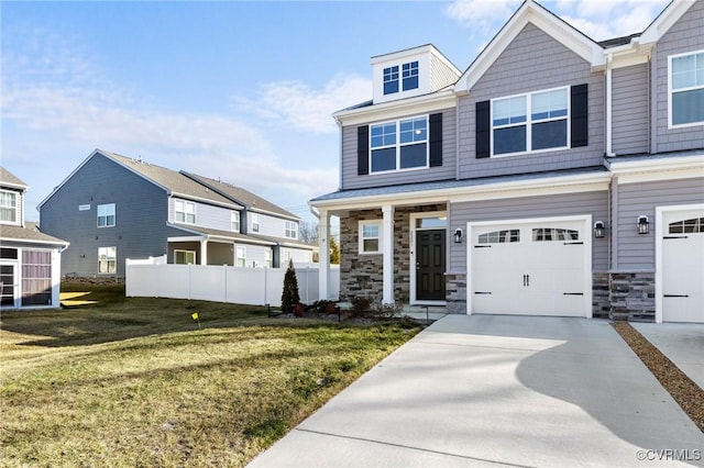 view of front facade with a garage and a front lawn