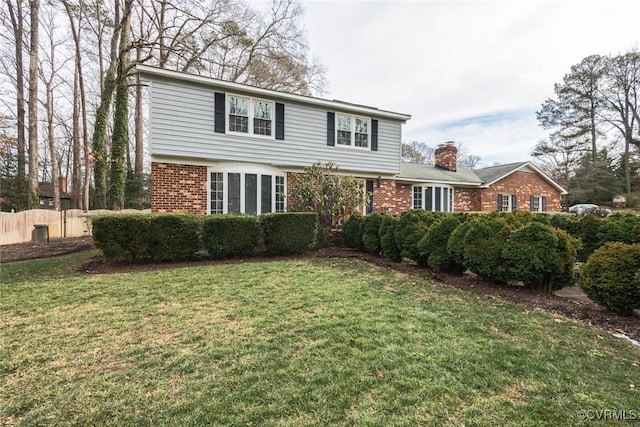 view of property with a front lawn