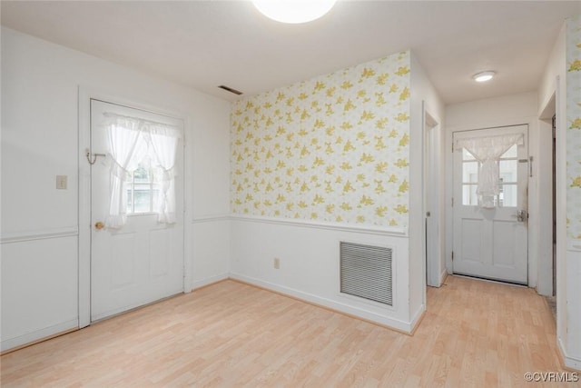 entrance foyer with hardwood / wood-style flooring