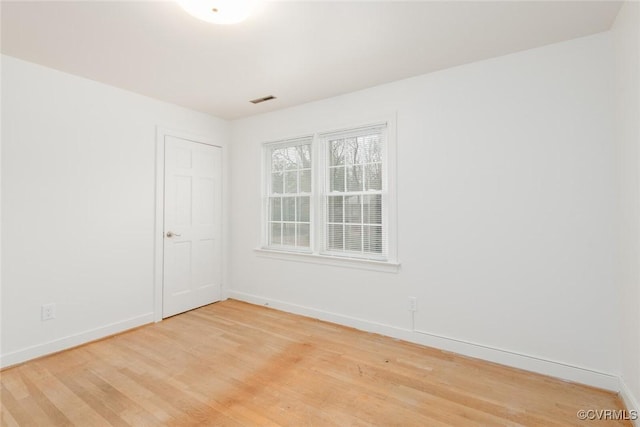 empty room featuring light hardwood / wood-style floors