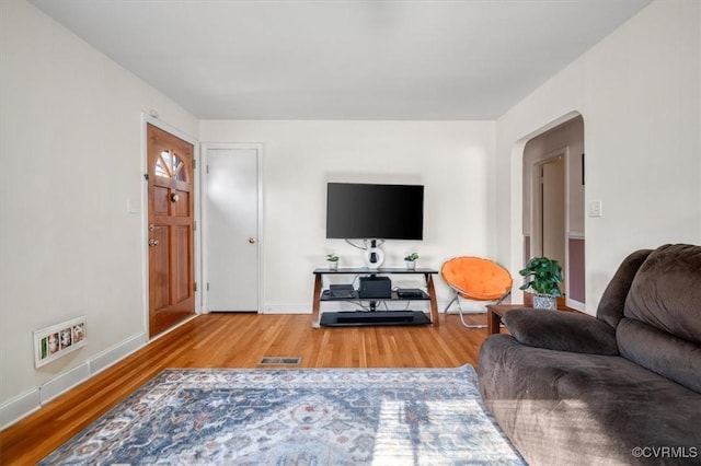 living room with hardwood / wood-style flooring