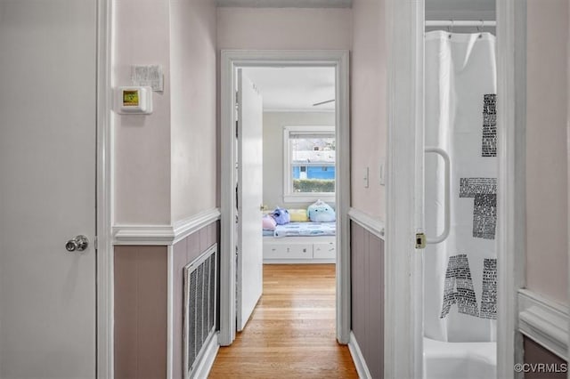 corridor featuring light hardwood / wood-style flooring