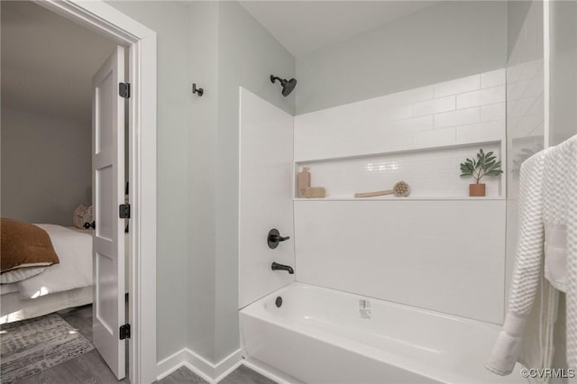 bathroom with bathing tub / shower combination