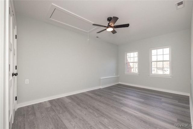 spare room with wood-type flooring