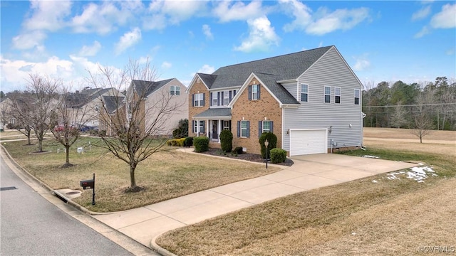 view of front of house featuring a garage and a front lawn