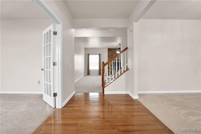 view of carpeted foyer