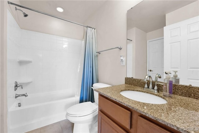 full bathroom featuring toilet, tile patterned floors, vanity, and shower / bathtub combination with curtain