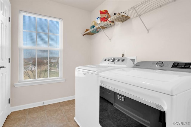 laundry room featuring washer and clothes dryer