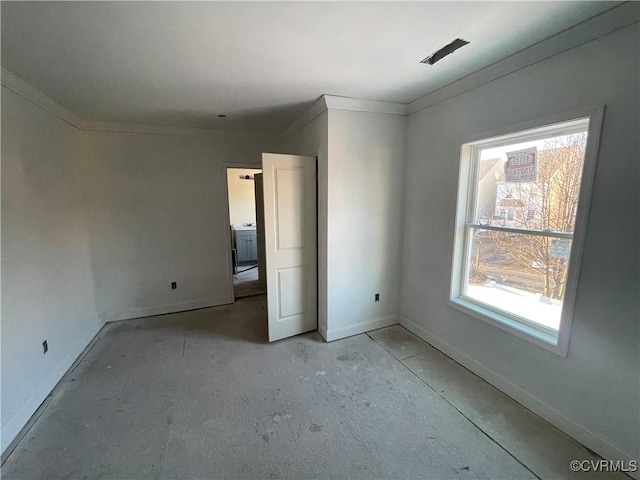 unfurnished bedroom featuring crown molding