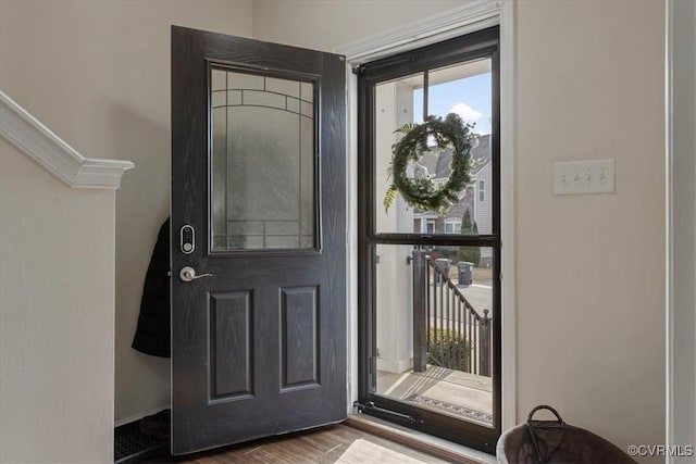 entrance foyer featuring hardwood / wood-style flooring