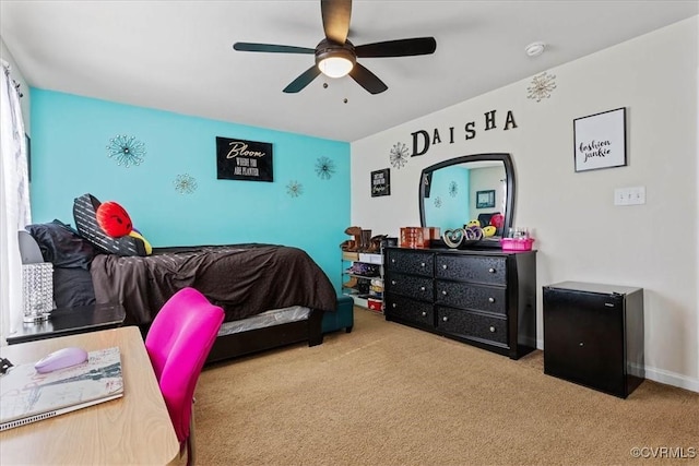 carpeted bedroom with ceiling fan