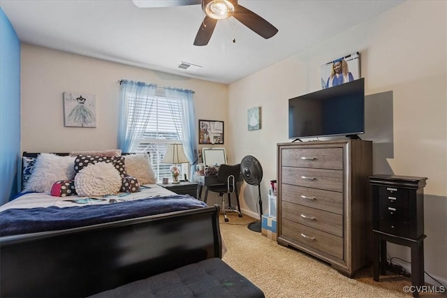 carpeted bedroom featuring ceiling fan