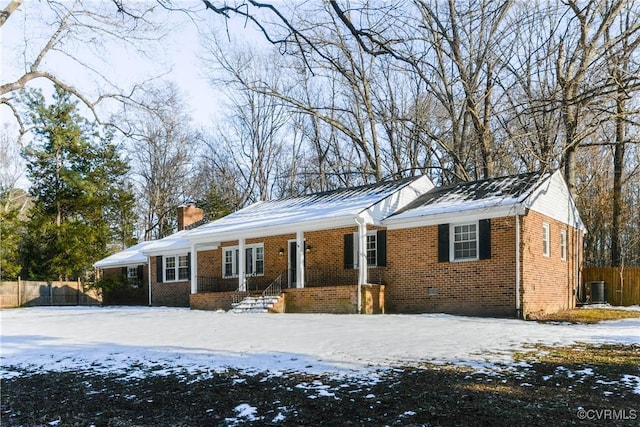 ranch-style home featuring central air condition unit