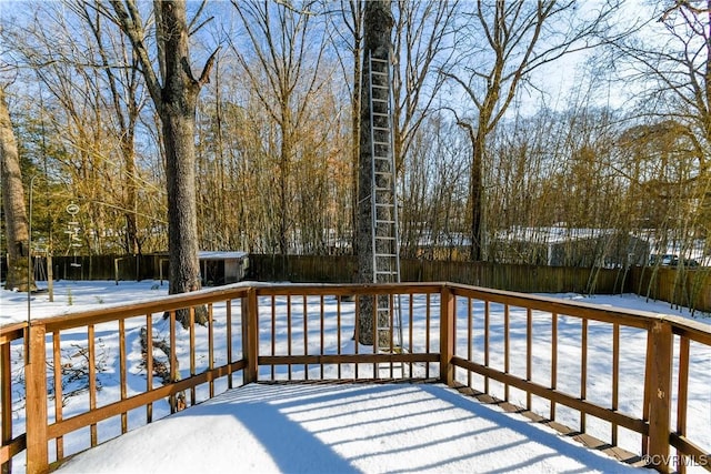 view of snow covered deck