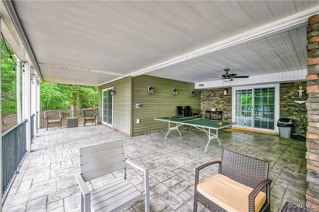 view of patio / terrace featuring ceiling fan