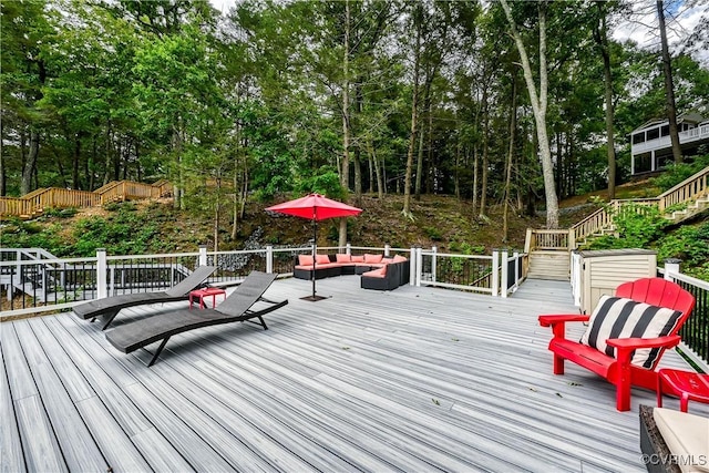 wooden terrace with outdoor lounge area