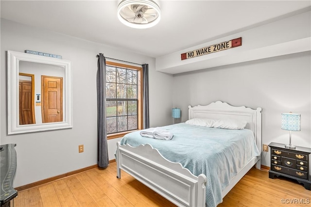 bedroom with light wood-type flooring