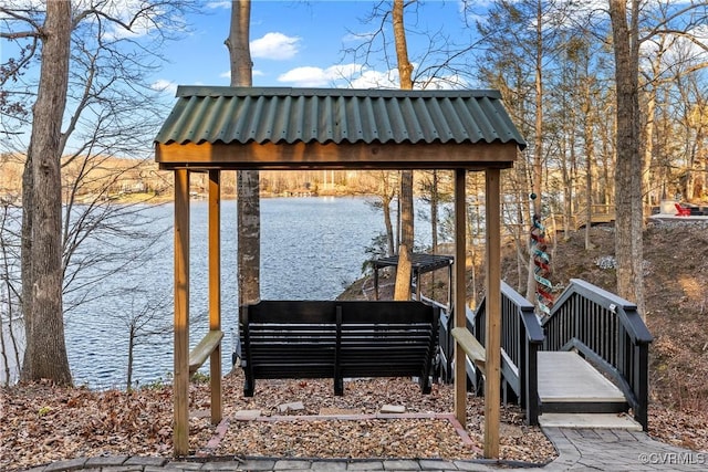 dock area with a water view