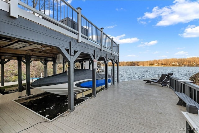 dock area featuring a water view