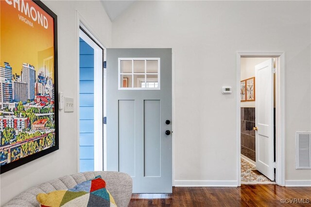 foyer entrance featuring dark hardwood / wood-style flooring