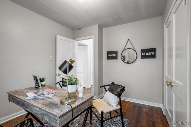 office space with dark hardwood / wood-style floors