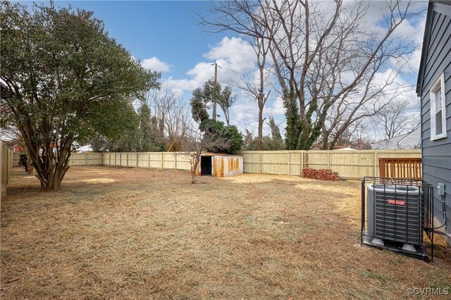 view of yard featuring central air condition unit