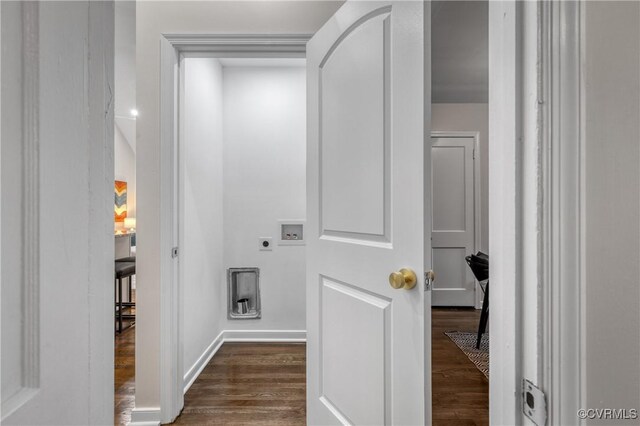 hallway with dark hardwood / wood-style flooring