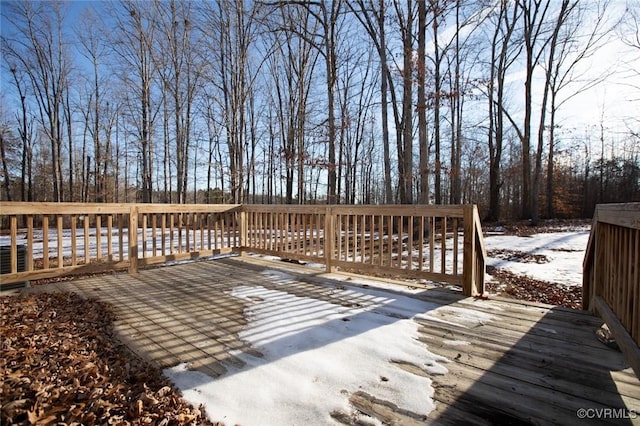 view of snow covered deck