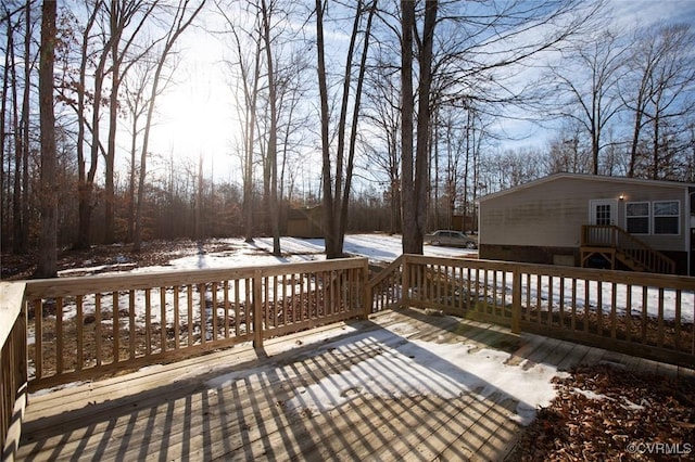 view of snow covered deck