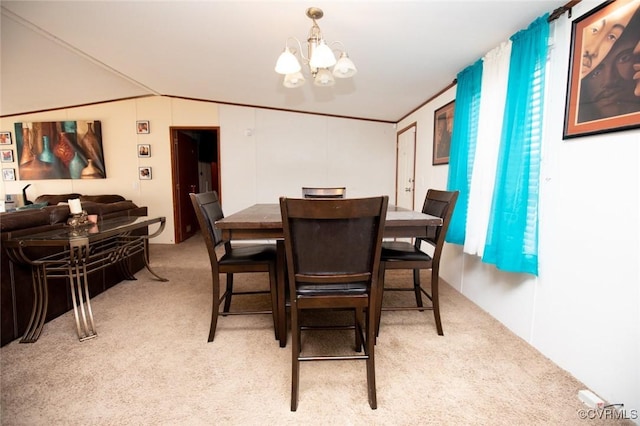 dining room with light carpet, lofted ceiling, and a notable chandelier