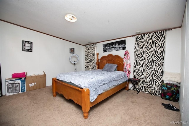 bedroom with carpet and ornamental molding