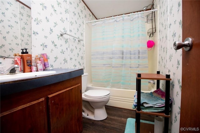 full bathroom featuring toilet, shower / bath combo, hardwood / wood-style floors, and vanity