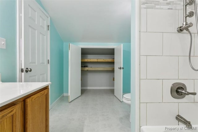 full bathroom with toilet, shower / bathtub combination, and vanity