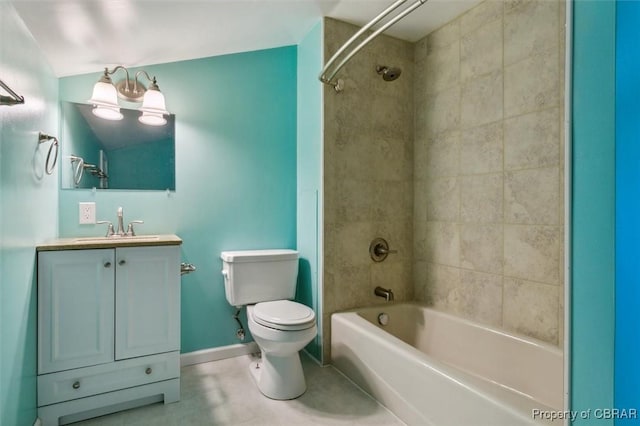 full bathroom with toilet, tiled shower / bath combo, and vanity