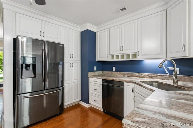 kitchen with dishwasher, white cabinetry, stainless steel fridge with ice dispenser, and sink