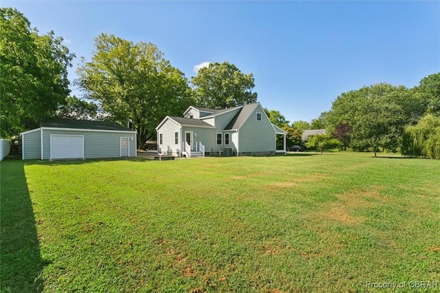 view of yard with an outdoor structure and a garage