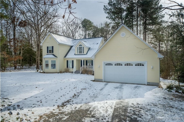 new england style home with a garage