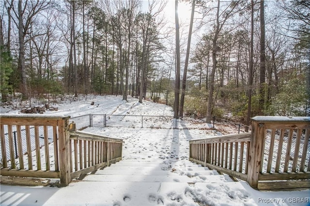 view of snow covered deck