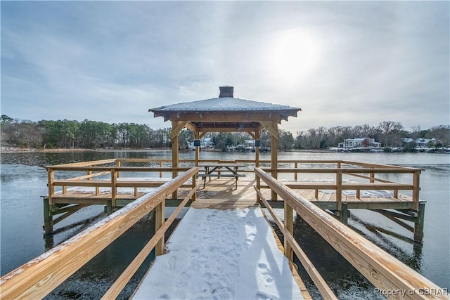 view of dock with a water view and a gazebo