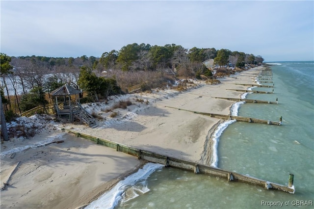 aerial view with a beach view and a water view