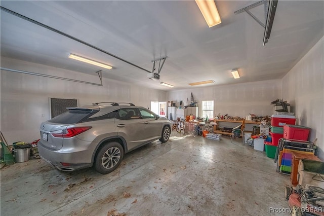 garage featuring a garage door opener