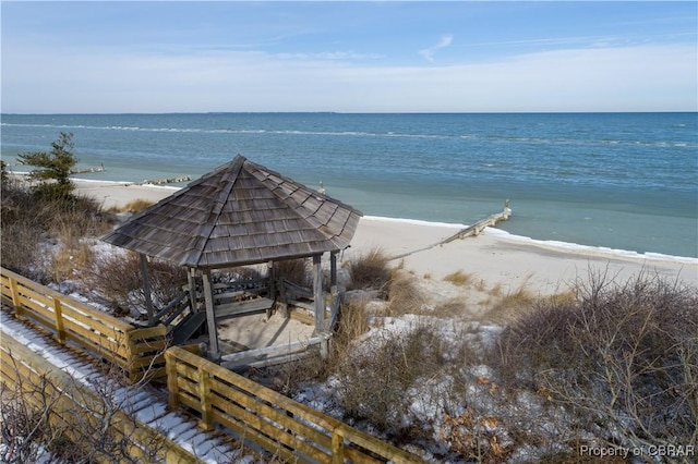 water view featuring a gazebo and a view of the beach