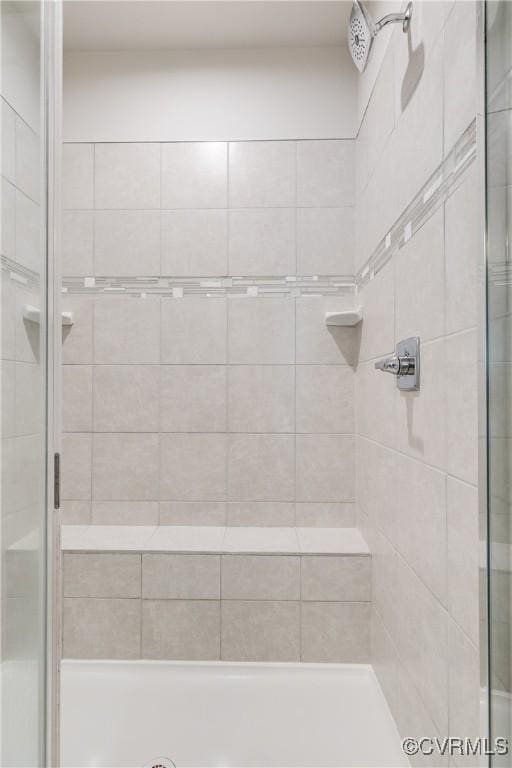 bathroom with an enclosed shower