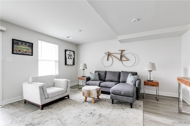 living room with hardwood / wood-style flooring